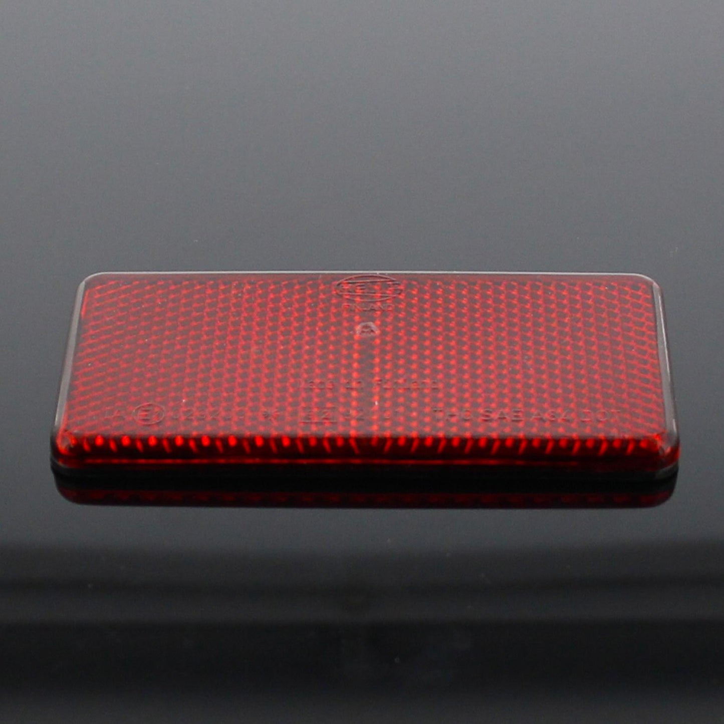 Hella reflector red self-adhesive 94x44x6.5mm